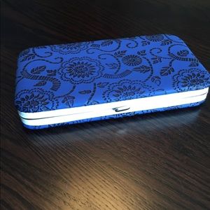 Faux leather wristlet, wallet. Floral embossed